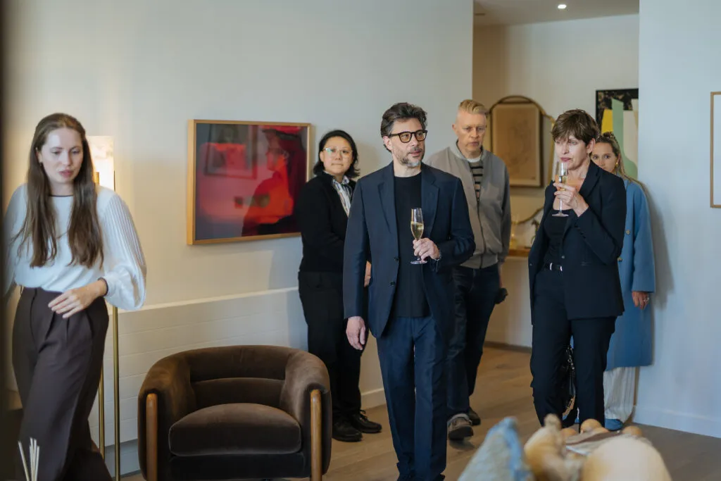 Guests touring a furnished show apartment at Herland Gardens.